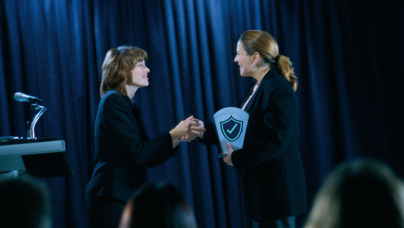 Woman receiving award