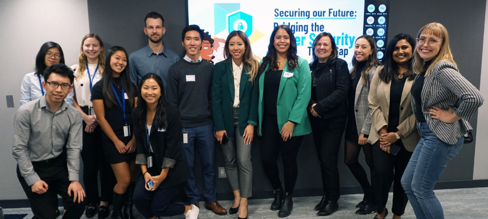 A group picture of people participating at the Securing our Future: Bridging the Cyber Security Talent Gap event.