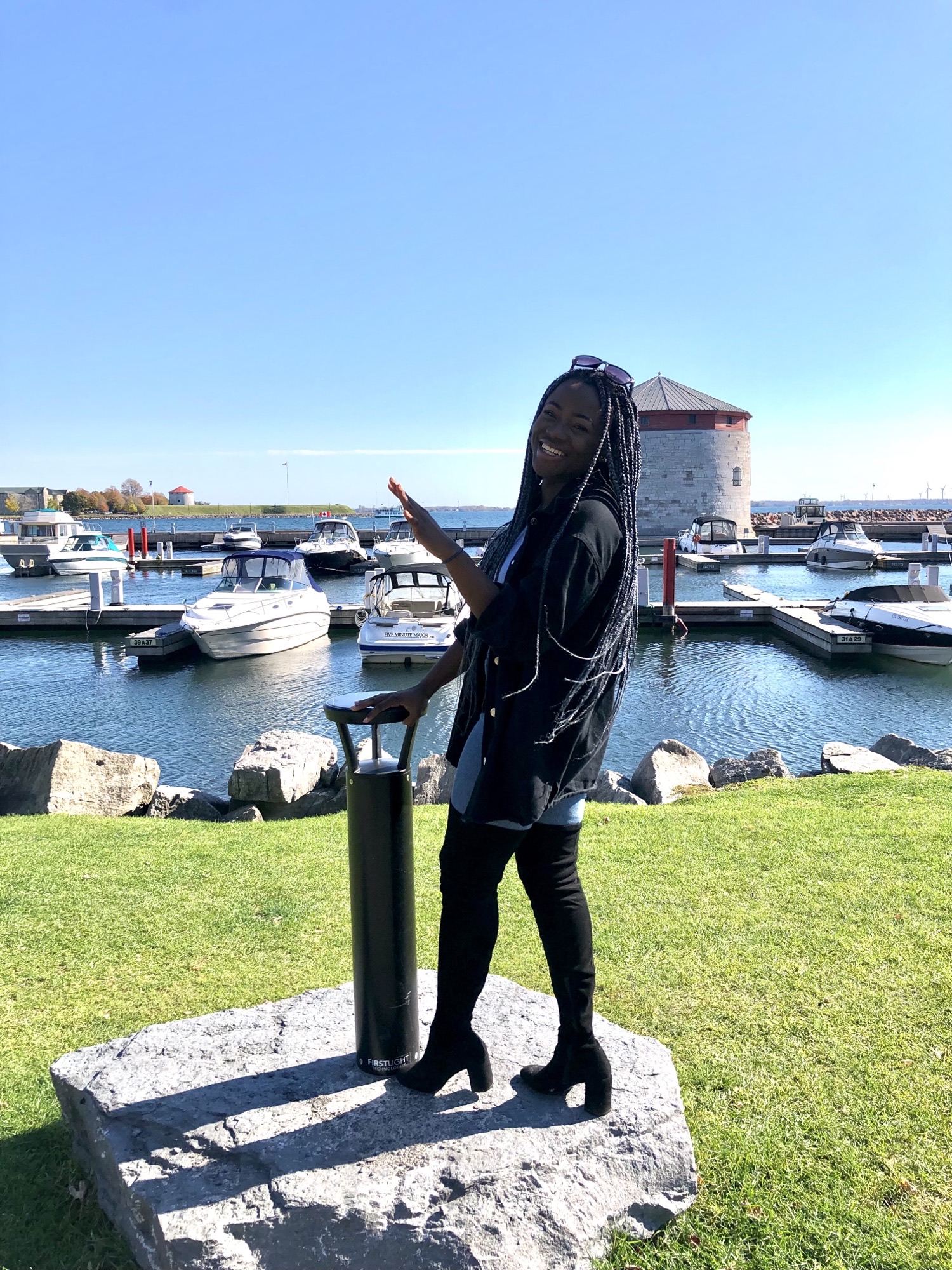 Maddie posing in front of a landmark