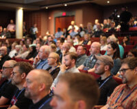 Participants attending the keynote session at the Isabel Bader Theatre.