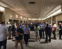 Attendees networking at the lobby in the Carlu.