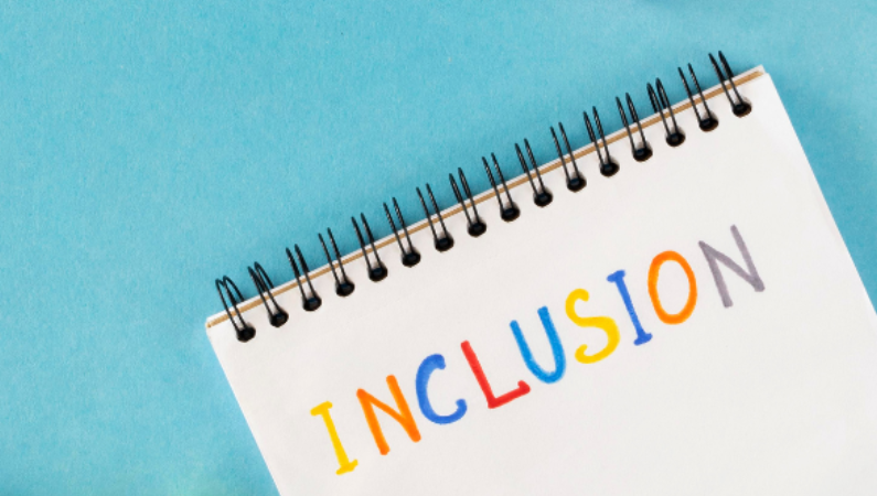 Notebook with the word, "inclusion" written in it.