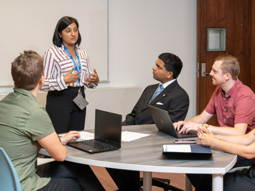 A group of staff having a discussion.