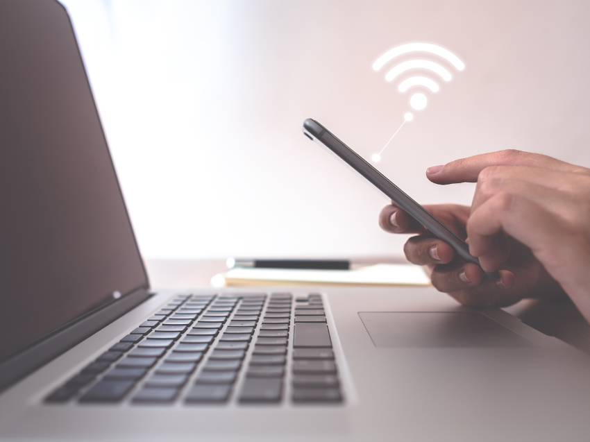 Person connecting to Wi-Fi on mobile device