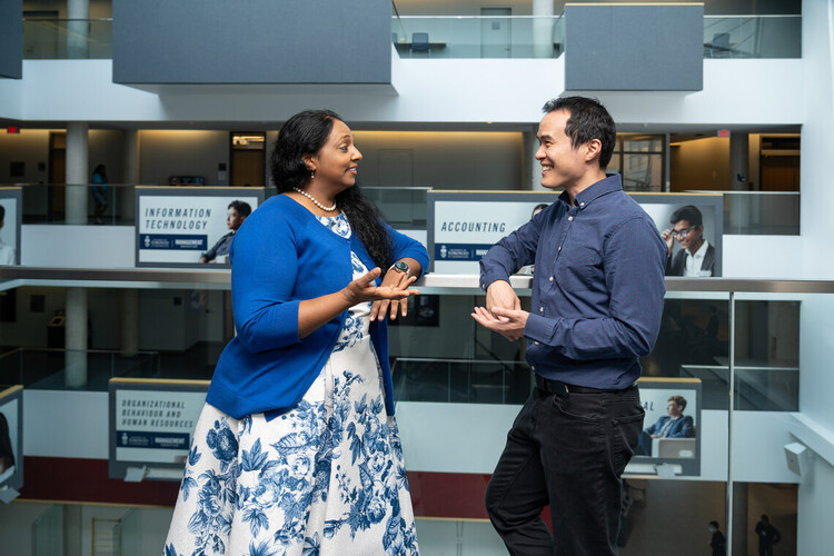 Two employees talking