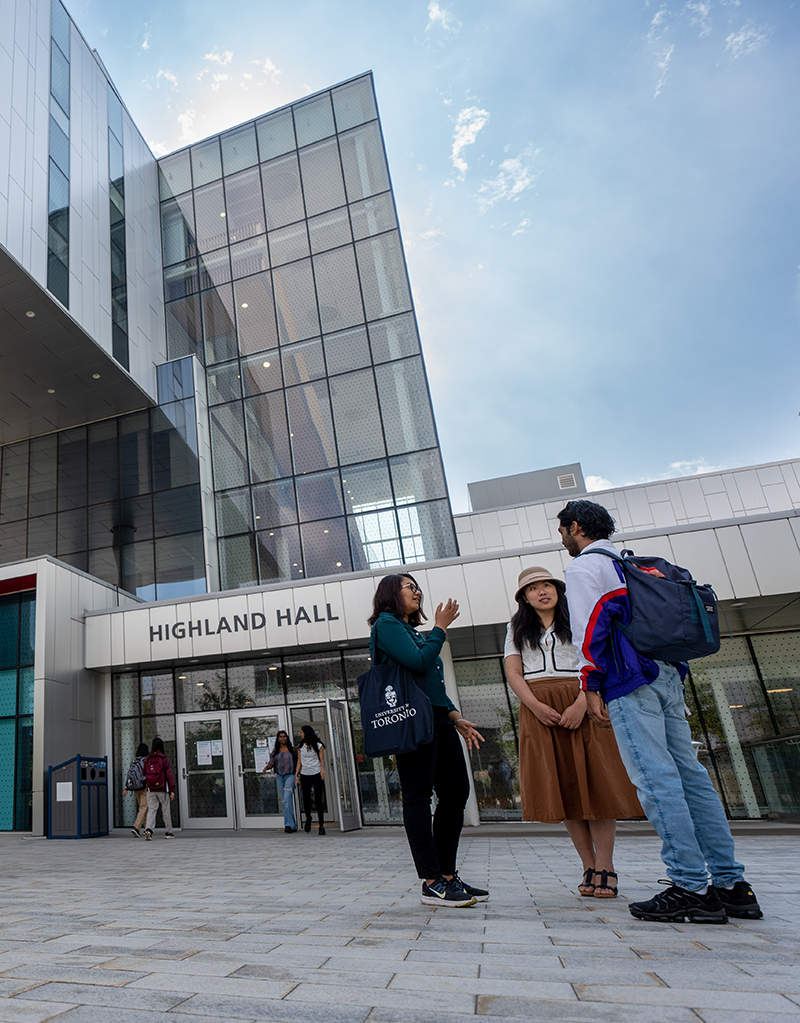 Students standing in front of Highland Hall