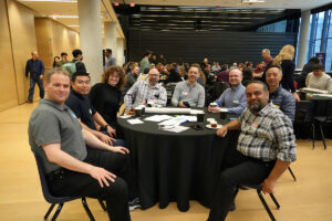 A group photo of attendees at the ITS all-staff meeting.