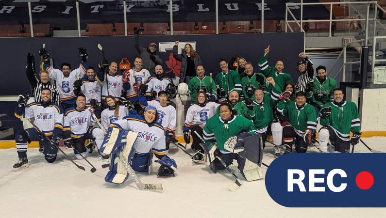 A group photo of the players participated in the hockey game.