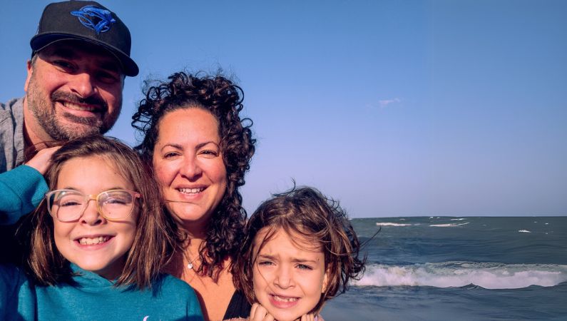 Jordan Homes and his family at the seaside